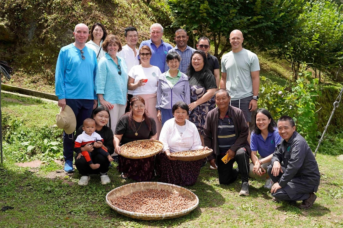 Truly Expat community exploring Bhutan’s hazelnut orchards
