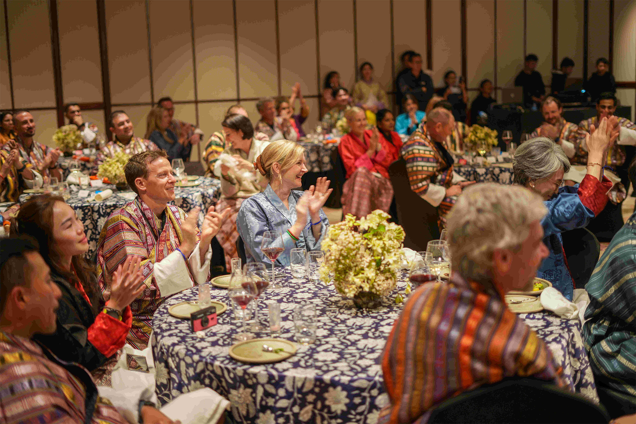 corporate delegates wearing gho and kira for dinner